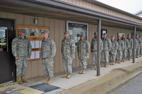 Soldiers attending the Warrior Leader Course at the Staff Sgt. John W. Kreckel NCO Academy at Fort Campbell, KY, display their military bearing and discipline as they wait in line for lunch Oct. 7th. Numerous soldiers of the 159th CAB have graduated on the Commandant's List in the last four consecutive classes. (U.S. Army photo by Spc. Jennifer Andersson)