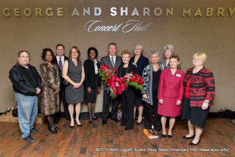 The Board of the Clarksville Community Concert Association pose for a photograph with George and Sharon Mabry