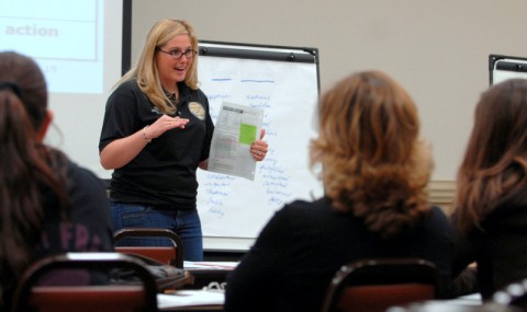 Jessi Mitchell, a Spouse Master Resilience Trainer for the 3rd Brigade Combat Team "Rakkasans," 101st Airborne Division and the wife of Capt. Drew Mitchell, a fire support officer in 1st Battalion, 187th Infantry Regiment, speaks to spouses of Soldiers assigned to the brigade while conducting Spouse Master Resilience Training Oct. 22 at the Fort Campbell Family Resource Center. The training was designed to address the challenges of being a military spouse by establishing positive thought processes. (U.S. Army photo taken by Sgt. Alan J. Graziano, 3rd Brigade Combat Team, 101st Airborne Division)