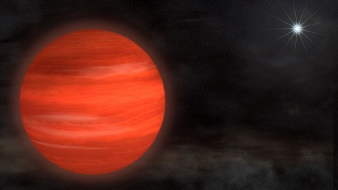 The "super-Jupiter" Kappa Andromedae b, shown here in an artist's rendering, circles its star at nearly twice the distance that Neptune orbits the sun. With a mass about 13 times Jupiter's, the object glows with a reddish color. (Credit: NASA's Goddard Space Flight Center/S. Wiessinger)