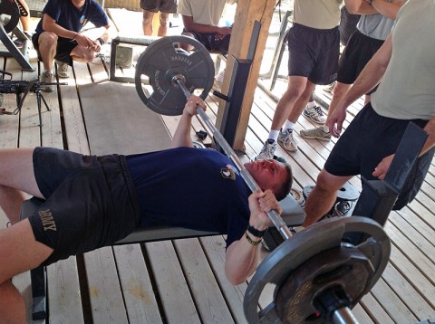 U.S. Army 1st Lt. Jeffery Shafer, platoon leader for 3rd Platoon, Company A, 3rd Battalion,187th Infantry Regiment, 3rd Brigade Combat Team “Rakkasans,” 101st Airborne Division (Air Assault), completes the bench press event at Combat Outpost Chergotaw, Nov. 1st, 2012. The Angel Rak Competition is a test that identifies the strongest and most physically fit squads in the Company. (U.S. Army photo by Capt. Erik Alfsen, 3-187th Chaplain)