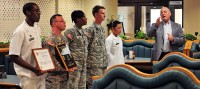 Retired Command Sgt. Maj. Carl E. Christian, who retired as the FORSCOM command sergeant major in 2005, emphasizes to soldiers with the 4th Brigade Combat Team, 101st Airborne Division, Oct. 17, 2012, the significance of earning the 101st Airborne Division Commanding General’s Best Dining Facility or “Best Mess” of the Quarter at Fort Campbell, Ky. This is the second time back-to-back that the Currahee Dining Facility earned this award. (U.S. Army photo by Maj. Kamil Sztalkoper, 4th Brigade Combat Team Public Affairs)