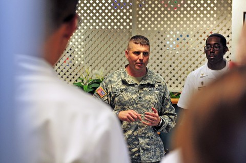 U.S. Army Col. Val C. Keaveny, Jr., the commander of 4th Brigade Combat Team, 101st Airborne Division, praises food service specialist with the 4th Brigade Dining Facility for their dedication to excellence, Oct. 17, 2012, during a ceremony where they received 101st Airborne Division Commanding General's Dining Facility of the Quarter Award at Fort Campbell, Ky. This is the second time back-to-back that the Currahee Dining Facility earned this award. (U.S. Army photo by Maj. Kamil Sztalkoper, 4th Brigade Combat Team Public Affairs)