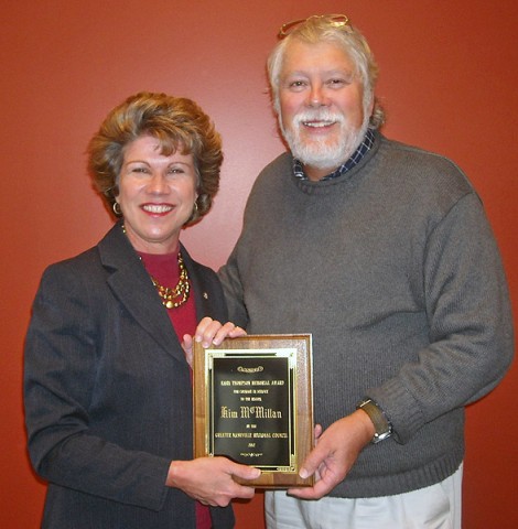 Clarksville Mayor Kim McMillan receives Hank Thompson Award from Sam Edwards, Executive Director/Chief Legal Counsel of the GNRC.