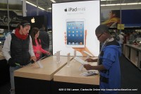 Best Buy customers checking out the iPads