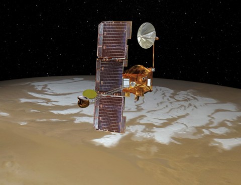 NASA's Mars Odyssey spacecraft passes above Mars' south pole in this artist's concept. The spacecraft has been orbiting Mars since October 24th, 2001. (Image credit: NASA/JPL)