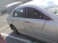 Chevrolet Malibu involved in a side swipe of a utility pole and rear end collision Thursday morning.