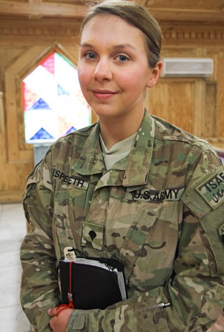 Spc. Erika Espeseth, a Madison, WI, native, is a chaplain’s assistant with the 3rd Special Troops Battalion, 3rd Brigade Combat Team “Rakkasans,” 101st Airborne Division (Air Assault), and serves her country by providing ministry support as a member of a religious support team at Forward Operating Base Salerno, Afghanistan. Espeseth carries her patriotism pridefully while combining it with her passion for God. (U.S. Army Photo by Sgt. 1st Class Abram Pinnington, TF 3/101 PAO)