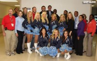 Tennessee Titans players and cheerleaders at the Department of Veterans Affairs Hospital giving thanks to veterans. (Photo by Gary Glenn)