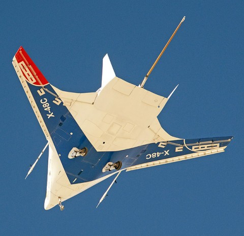 Boeing's X-48C Blended Wing Body research aircraft is silhouetted against the morning sky over Edwards Air Force Base during its fifth test flight on Oct. 16. It has flown eight times since Aug. 7. (NASA / Carla Thomas) Boeing's X-48C Blended Wing Body research aircraft is silhouetted against the morning sky over Edwards Air Force Base during its fifth test flight on Oct. 16. It has flown eight times since Aug. 7. (NASA / Carla Thomas)