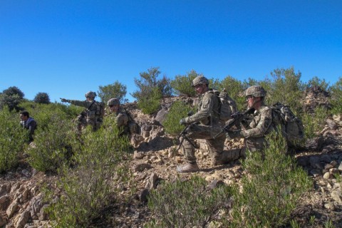 Soldiers assigned to Company C, 3rd Battalion, 187th Infantry Regiment, 3rd Brigade Combat Team “Rakkasans,” 101st Airborne Division (Air Assault), point out areas of interest during a patrol in search of signs of insurgent activity in the mountains near Combat Outpost Bowri Tana, Afghanistan, Nov. 30th, 2012. (U.S. Army photo by Sgt. 1st Class Abram Pinnington, Task Force 3/101 Public Affairs)