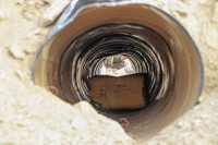 A soldier from the 203rd Corps, AfghanNational Army, takes a closer look into a culvert at the improvised explosive device during an ANA-led counter IED course at Camp Parsa, Afghanistan, Nov. 20, 2012. The six-week counter IED course is designed to equip ANA soldiers with the skills to help defeat Afghanistan’s largest threat to its people and security forces. (U.S. Army photo by Sgt. 1st Class Abram Pinnington, TF 3/101 Public Affairs)