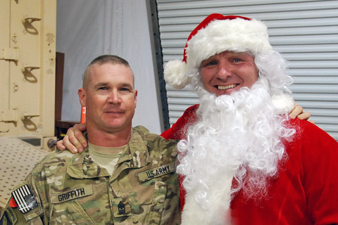 Command Sgt. Maj. Jeffrey Griffith, Battalion operations senior non-commissioned officer in charge, 3rd Battalion, 187th Infantry Regiment, 3rd Brigade Combat Team “Rakkasans,” 101st Airborne Division (Air Assault), poses with Santa Clause during a celebration at Forward Operating Base Salerno, Afghanistan, Dec. 24th, 2012. (Courtesy photo)