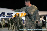 A Strike soldier waves at his family as he heads to the Welcome Home Ceremony Thursday morning