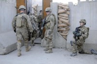 Soldiers from 3rd Platoon, Company D, 1st Battalion, 327th Infantry Regiment, 1st Brigade Combat Team, 101st Airborne Division (Air Assault), move into the Afghan Customs Department at Torkham Gate, Afghanistan, Dec. 20, 2012. The gate lies on the border of Afghanistan and Pakistan and is monitored by the Afghan Customs Police, Afghan Border Police and the National Directorate of Security. (Sgt. Jon Heinrich/Task Force 1101 PAO)