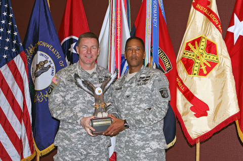 Maj. Gen. James C. McConville, the commander of the 101st Airborne Division (Air Assault) handed Col. Charles R Hamilton, the commander of the 101st Sustainment Brigade “LifeLiners” the Combined Federal Campaign trophy that gets held in the headquarters of the recognized organization until the next years ceremony. The ceremony was held January 22nd on Fort Campbell, KY. (U.S. Army photo by: Sgt. 1st Class Mary Rose Mittlesteadt, 101st Sustainment Brigade.)