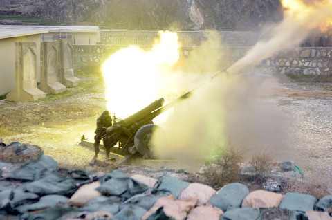 An Afghan National Army artilleryman fires his 122 mm D-30 Howitzer Dec. 26, at Combat Outpost Nanglam. The ANA artillery fired fire missions in support of their soldiers and U.S. Army soldiers from Security Forces Assistance and Advisory Team-6, 1st Brigade Combat Team, 101st Airborne Division as they resupplied Chapah Darah.