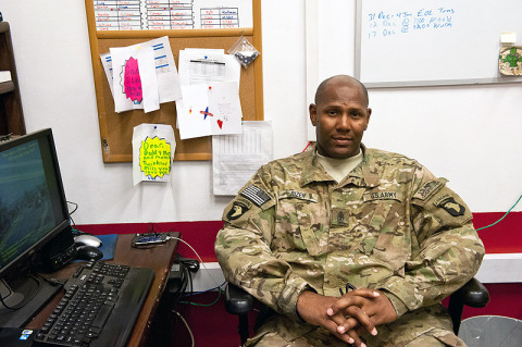 First Sgt. Arthur Rizer, E Troop, 2nd Squadron, 17th Cavalry Regiment, poses with letters and cards from his family at Forward Operating Base Fenty, Afghanistan, Dec. 11th, 2012. "Soldiers trust me to guide them," said Rizer. (U.S. Army photo by Sgt. Duncan Brennan, 101st CAB public affairs)