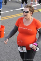 A pregnant runner