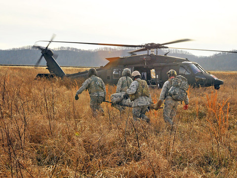 Soldiers from the 7-101st GSAB, 159th CAB, 101st Airborne Division and Airmen from 19th ASOS, Fort Campbell, KY, conduct joint Medevac training at Fort Knox, KY. This training served to sharpen the skills of the service members. (Photo by Capt. John Giaquinto)