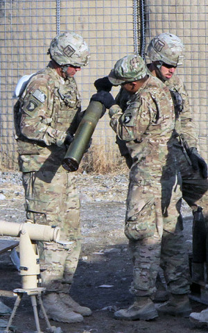 U.S. Army Spc. Taylor Barnes (left), a native of Canandaigua, NY, an artilleryman assigned to Battery B, 3rd Battalion, 320th Field Artillery Regiment, 3rd Brigade Combat Team “Rakkasans,” 101st Airborne Division (Air Assault), selflessly serves his country while deployed to Afghanistan in support of Operation Enduring Freedom. (U.S. Army photo by Spc. Brian Smith-Dutton, TF 3/101 Public Affairs)