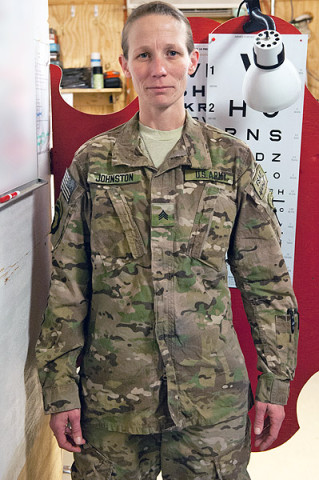 Sgt. Lydia Johnston, Headquarters and Headquarters Troop, 2nd Squadron, 17th Cavalry Regiment medic enjoys helping her fellow soldiers when they are sick or injured at Forward Operating Base Fenty, Afghanistan, on Dec. 21st, 2012. (U.S. Army photo by Sgt. Duncan Brennan, 101st CAB public affairs)