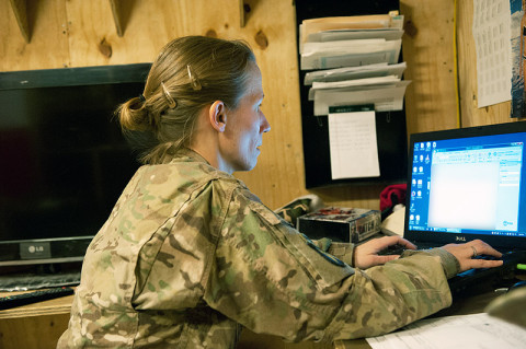 Sgt. Lydia Johnston, Headquarters and Headquarters Troop, 2nd Squadron, 17th Cavalry Regiment medic sends an email to coordinate a flight physical for one of the crew chiefs assigned to Task Force Saber at Forward Operating Base Fenty, Afghanistan, on Dec. 19th, 2012. (U.S. Army photo by Sgt. Duncan Brennan, 101st CAB public affairs)