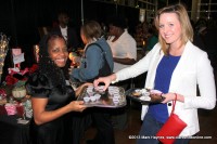 A woman samples one of the Tea Blends from Natural Choices Botania.