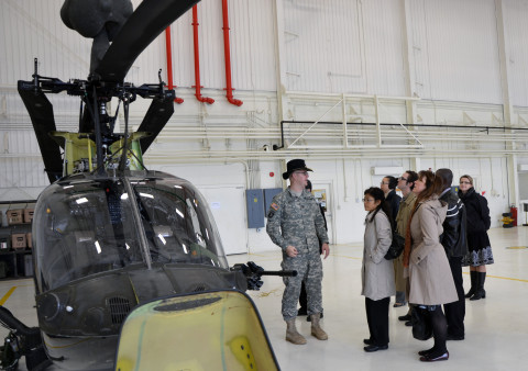 Capt. Quentin McCart, the commander with Troop E, 7th Squadron, 17th Cavalry Regiment, teaches the Meharry Medical College residents about the OH58D, Kiowa Warrior during a medical work site visit on Fort Campbell, Ky. The American College of Occupational and Environmental Medicine conducts a work site visit with the 7th Squadron, 17th Cavalry Regiment, to educate medical physician residents on components of occupational and environmental medicine.