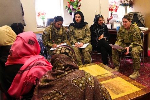 1st Brigade Combat Team, 101st Airborne Division Female Engagement Team members Spc. Samantha Banda, from La Feria, Texas, Spc. Bianca Roig from Eagle Pass, Texas, and Sgt. Stacey Coffield from Orange County, Calif. discuss a variety of issues with female members of the Afghan Uniformed Police and Afghan Border Patrol at the ABP compound in Jalalabad, Afghanistan, Jan. 18th, 2013. (U.S. Army photo by Sgt. 1st Class John D. Brown, TF 1-101 Public Affairs)