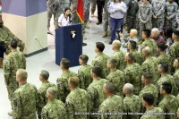 Madeline Cox addressing her dad Lt. Col. Clint Cox and the returning soldiers