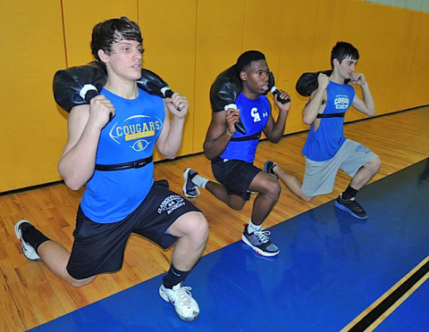 Junior Connor Wise, Sophomores Josh Anderson & Jacob Morton work hard during spring conditioning at Clarksville Academy.  The Polar GX Cardio band monitors their progress as the workout intensifies. 