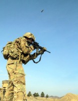 Staff Sgt. Robert Dodge, a cavalry scout assigned to Troop B, 1st Squadron, 33rd Cavalry Regiment, 3rd Brigade Combat Team “Rakkasans,” 101st Airborne Division (Air Assault), fires the M4 carbine rifle at the shooting range portion of the brigade noncommissioned officer and Soldier of the quarter competition on Forward Operating Base Salerno, Afghanistan, Feb. 15, 2013. Competitors were timed on performing a five mile road march as well as complete five stations throughout the competition. (U.S. Army photo by Spc. Brian Smith-Dutton, Task Force 3/101 Public Affairs)