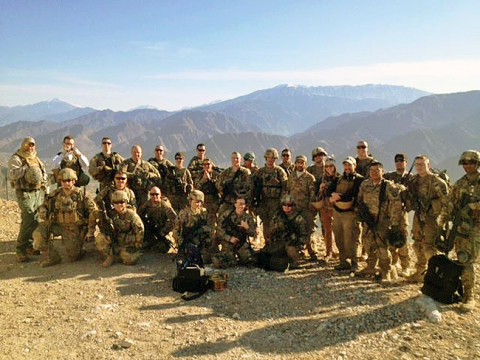 Members of Combined Team Bastogne, 1st Brigade Combat Team, 101st Airborne Division and Provincial Reconstruction Team Kunar pose for a photo Jan. 24th, 2013, after completing the treacherous hike to the top of Observation Point Bull Run near Camp Wright and Asadabad, the capital city of Kunar Province, Afghanistan. (Courtesy photo by U.S. Army 1st Lt. Lisa Maginot, Task Force 426)