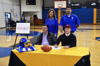 Clarksville Academy senior Nolan Blake, family, football coach Todd Hood and Head of School Kay Drew.