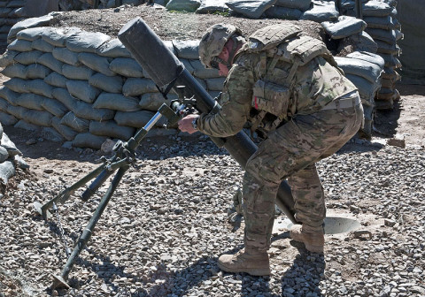 U.S. Army Spc. Donavan Dauzat, a mortarman with Company C, 3rd Battalion, 187th Infantry Regiment, 3rd Brigade “Rakkasans,” 101st Airborne Division (Air Assault), adjusts a 120 mm mortar tube during a training exercise, March 1, 2013, at Combat Outpost Bowri Tana. The mortar section trains daily for fire missions. (U.S. Army Photo by Spc. Alex Kirk Amen, 115th Mobile Public Affairs Detachment)