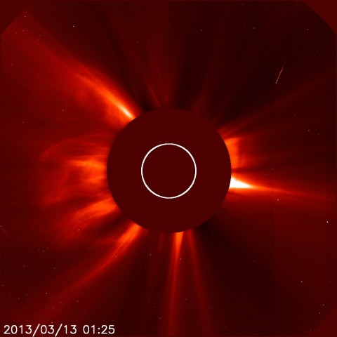 ESA and NASA’s Solar Heliospheric Observatory (SOHO) captured this image of a coronal mass ejection bursting off the leftside of the image at 9:25 p.m. EDT on March 12, 2013. This sun itself is obscured in this image, called a coronagraph, in order to better see the dimmer structures around it. (ESA & NASA/SOHO)