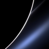 Dawn on Saturn is greeted across the vastness of interplanetary space by the morning star, Venus, in this image from NASA’s Cassini spacecraft. Venus appears just off the edge of the planet, in the upper part of the image, directly above the white streak of Saturn’s G ring. Lower down, Saturn’s E ring makes an appearance, looking blue thanks to the scattering properties of the dust that comprises the ring. A bright spot near the E ring is a distant star. (Image Credit: NASA/JPL-Caltech/Space Science Institute)