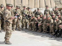 U.S. Army Lt. Col. Donald Evans, squadron commander for 1st Squadron, 33rd Cavalry Regiment, 3rd Brigade Combat Team “Rakkasans,” 101st Airborne Division (Air Assault), gives a quarterly update to his squadron about success so far while deployed at Camp Clark, Afghanistan, March 4, 2013. Evans stressed to the troops to stay vigilant. (U.S. Army photo by Spc. Brian Smith-Dutton TF 3/101 Public Affairs)