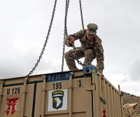 Pfc. Caleb Johnson, an infantryman assigned to Company D, 3rd Battalion, 187th Infantry Regiment, 3rd Brigade Combat Team “Rakkasans,” 101st Airborne Division (Air Assault) prepares equipment boxes for transportation at Combat Outpost Tera Zeyi, Afghanistan, Feb 21, 2013. Soldiers assigned to COP Tera Zeyi have been operating there for more than six months in support of Operating Enduring Freedom. (U.S. Army photo by Spc. Brian Smith-Dutton, TF 3/101 Public Affairs)