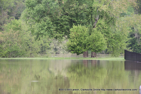 A small spur of land is all that separates Liberty Park from the raging Cumberland River