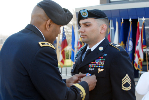 Sgt. 1st Class Matthew J. Loheide is pinned with the Silver Star medal, April 5, by Maj. Gen. Leslie C. Smith, commanding general of the 20th Support Command (CBRNE), during a ceremony outside the 101st Airborne Division’s 