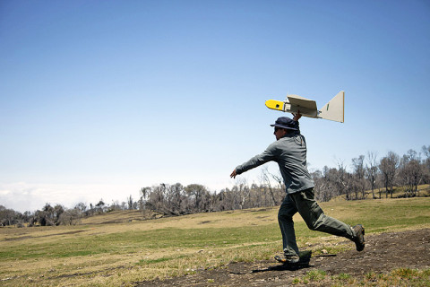 Ames research scientist Rick Kolyer launches Dragon Eye UAV. (Image credit: NASA/ Matthew Fladeland)