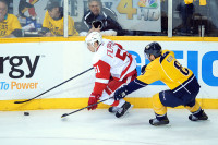 Detroit Red Wings center Valtteri Filppula (51) moves the puck against  Nashville Predators defenseman Kevin Klein (8) during the second period at Bridgestone Arena. (Randy Sartin – USA TODAY Sports)