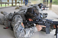 Soldiers of the 160th Special Operations Aviation Regiment (Airborne) conduct weapons-qualification while wearing their gas masks during the Noncommissioned Officer, and Soldier of the Year Competition, April 15-18 at Fort Campbell, Ky. (Photo by Staff Sgt. Ricardo Branch, 160th SOAR (A) Public Affairs)