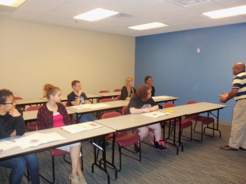 Damon Jennings, of the Daymar Institute  teaches interpersonal communication skills to students enrolled in the LEAP Youth Career Development Program.