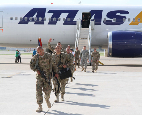 Soldiers from 3rd Brigade “Rakkasans,” 101st Airborne Division (Air Assault), exit the air craft after their long journey home at Fort Campbell Ky., May 29, 2013. The returning Soldiers have just completed their nine month deployment to Afghanistan, where they assisted the Afghan National Security Forces in taking the lead in operations for their country. (U.S. Army Photo by Spc. Brian Smith-Dutton, 3/101 Public Affairs)