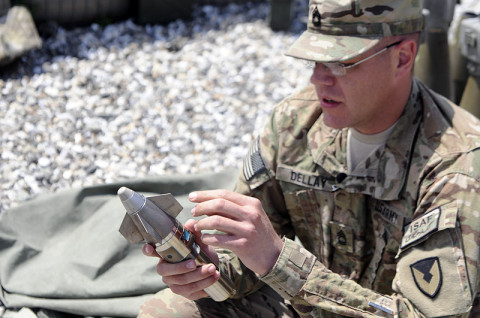 U.S. Army Sgt. 1st Class Brent Dellay, the Precision Guidance Kit Net Noncommissioned Officer in Charge with the Fires Center of Excellence at Fort Sill, OK and native to St. Louis, MO, explains the various parts of a XM1156 PGK Fuse April 29, 2013 at Forward Operating Base Joyce, Kunar Province, Afghanistan. (U.S. Army photo by Sgt. Jon Heinrich, CT 1-101 Public Affairs)