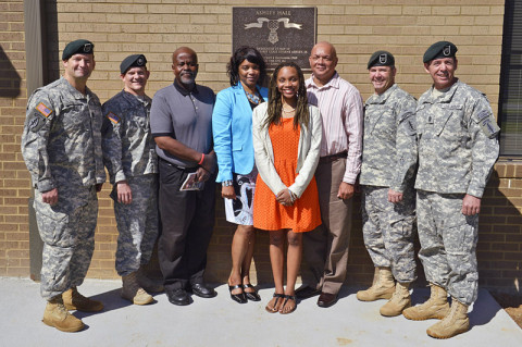 5th Special Forces Group teams are joined by members of the Ashley family following the dedication of the 3rd Battalion, 5th SFG (A) operations complex in honor of Sgt. 1st Class Eugene Ashley, Jr., May 23, 2013. Ashley was represented by (L to R) his nephew, daughter-in-law, granddaughter and son, retired Army Sgt. 1st Class Darrin Ashley. Representing the 5th SFG (A) is (L to R) Command Sgt. Maj. Lyle Marsh, command sergeant major of the 3rd Bn., 5th SFG (A), Lt. Col. Lewis Powers, commander of the 3rd Bn., 5th SFG (A), Col. Scott Brower, commander of the 5th SFG (A), and Command Sgt. Maj. Dwayne Cox, command sergeant major of the 5th SFG (A). (Photo courtesy of Mr. Sam Shore)