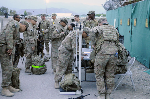 U.S. Soldiers with 1st Brigade Combat Team, 101st Airborne Division, gather to weigh in for a Danish Contingent March at Jalalabad Airfield, Afghanistan, April 20th, 2013. (Sgt. Jon Heinrich/Released)